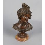 A French bronzed spelter bust of a girl, late 19th/early 20th century, with a wreath of flowers in