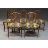 A set of four Sheraton style mahogany side chairs, early 20th Century, upholstered in leopard