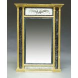 A Regency gilt wood mirror, with reverse painted glass panels decorated with wreath and grape vines,