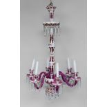 A Bohemian ruby and white overlay glass six light chandelier, 19th century, decorated to the opaline