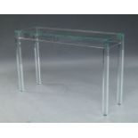 An Italian glass side table, of recent manufacture, the rectangular top on square legs, 72cm high