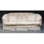 A three seater button back sofa, of recent manufacture, with cream damask pattern upholstery and