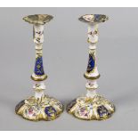 A pair of English enamel candlesticks, 18th century, decorated with panels of flowers, 17.5cm