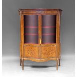 A French mahogany, kingwood and marquetry inlaid display cabinet, 20th Century, applied with gilt