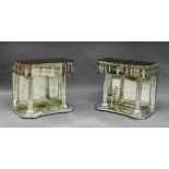 A pair of engraved mirror glass console tables , 20th Century, the sectional wavy frieze over mirror