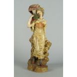 An Austrian terracotta and painted model of a young woman, late 19th century, modelled wearing a