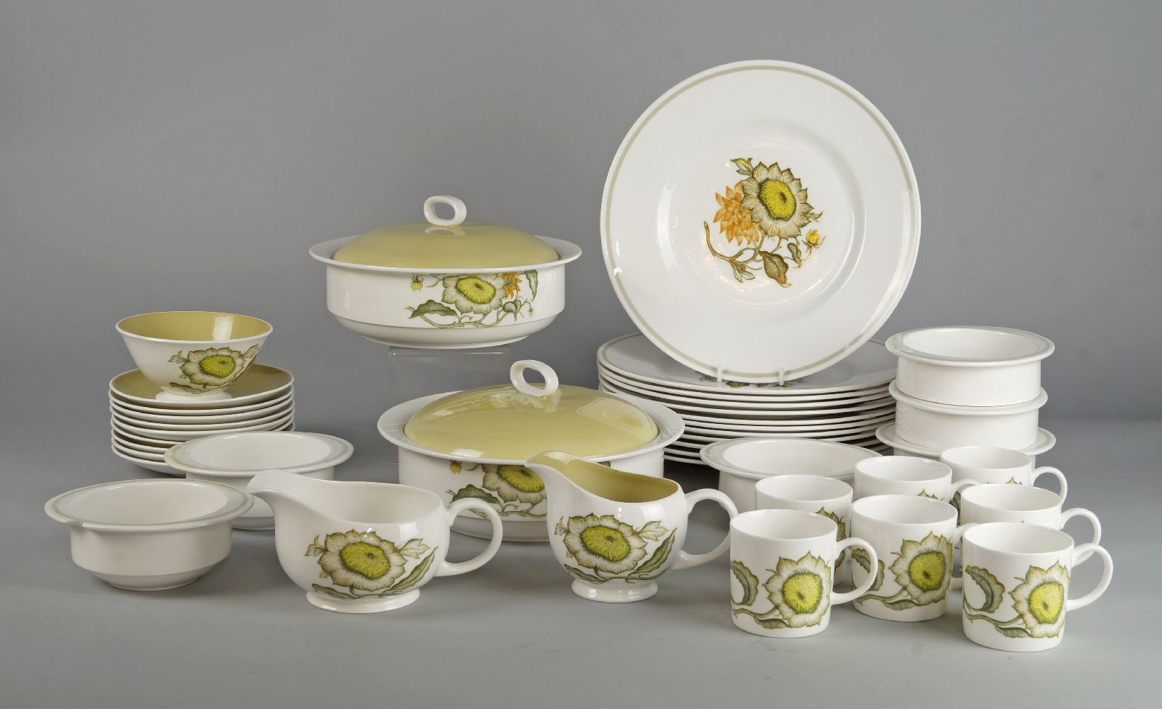 A Susie Cooper bone china dinner and coffee service, Sunflowers, to comprise twelve dinner plates,