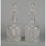 A pair of cut glass decanters in the Georgian taste, late 19th/early 20th century, the neck with two