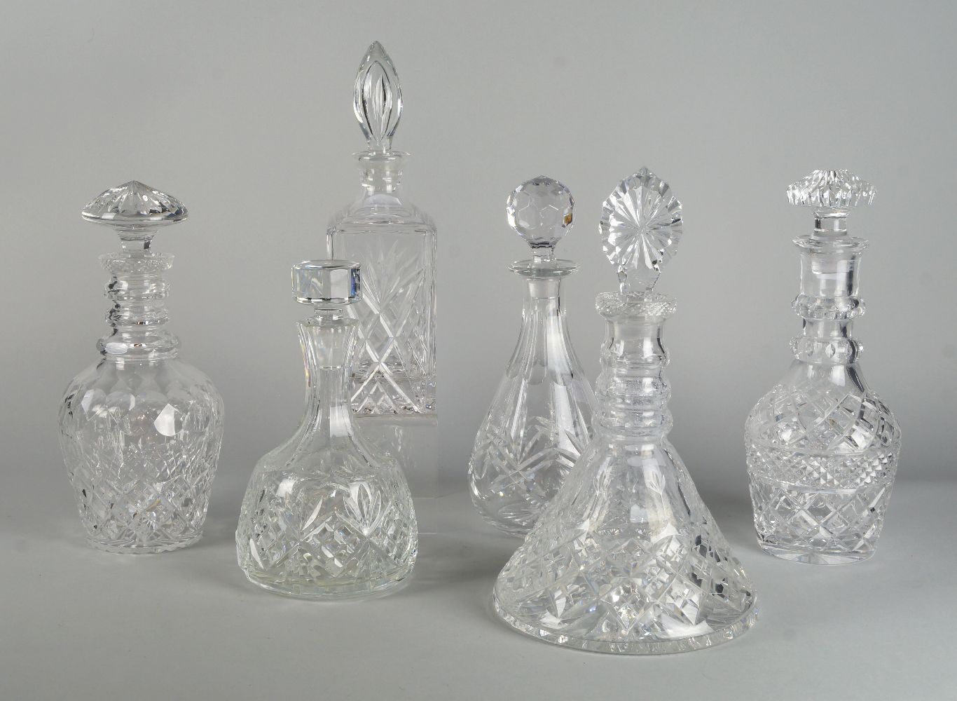 A Captains style glass decanter, 20th century, with a conical base and ring moulded neck, 20th
