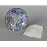 A William Adams printed pottery saucer, late 19th/early 20th century, decorated with three vignettes