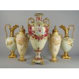 A pair of Royal Bonn urns and covers, late 19th/early 20th century, painted and gilded with sprays
