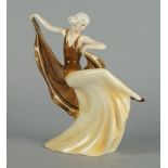 A Katzhutte porcelain figure of an elegant dancing girl. 20th century, modelled in a brown and