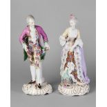 A pair of Continental porcelain 'Chelsea' type figures of a lady and gentleman, probably Samson,