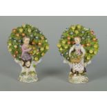 A pair of Continental porcelain Bow type figures of a boy and girl, probably Samson, late 19th