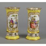 A pair of Meissen porcelain spill vases, late 19th century, with outside decoration of vignettes