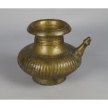 An Indian brass lota, 17th century, 15cm high