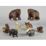 A pair of German carved wood Black forest type bears, 20th century, 14cm high, together with a