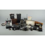 A collection of cameras and radios to include a Standard Micronic Ruby radio, two Realtone 'Radio