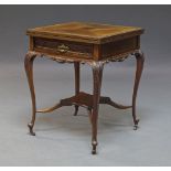 An Edwardian mahogany envelope card table, the square top with four leaves enclosing green baize