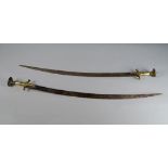 A pair of steel and brass swords, shamshir, Iran, 19th century, the blades later, 79.5cm (2)