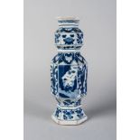 A Chinese porcelain hexagonal vase, Kangxi, painted in underglaze blue to the panels of the main