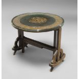 A Chinese circular folding table, 20th century, inset with a circular panel of long dragons