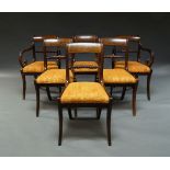 A set of six Regency mahogany dining chairs, with carved horizontal rope twist splats, over