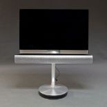 A Bang & Olufsen Beovision 7 lcd television, with soundbar and stand, screen 88cm x 52cm