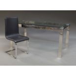 An Italian glass and chrome dining table, 77cm high x 160cn wide x 80cm deep together with six