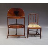 A George III mahogany bow front corner wash stand, the top with shaped splash back above lidded