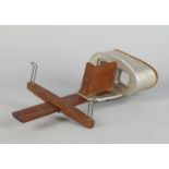 An Underwood and Underwood etched aluminium and wood stereoscope viewer, later 19th century, 34cm