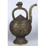 A brass moulded globular ewer, in the Safavid style, 20th century, with faceted curving spout,