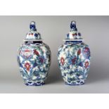 A pair of Boch Frere Keramics hexagonal jars and covers, in the Iznik style, Belgium, late 19th/