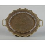 A Chinese engraved copper twin handled tray, 20th century, with pierced fretwork to the body,