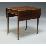 A George III mahogany Pembroke table, with twin flap rectangular top above frieze drawer, on