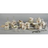 An extensive Children's or Doll's porcelain tea and dinner service, early/mid 20th century,