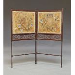 A Victorian mahogany two fold decoupage screen, by James Hicks, Dublin Furniture Maker, the top with