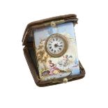A late 19th century purse travel watch with painted enamel surround, the circular white enamel