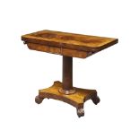 A Regency mahogany and cross banded card table, the rectangular fold over top enclosing green