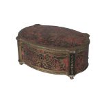 A French tortoiseshell and brass inlaid oval casket, 19th century, of shaped online, on turned brass