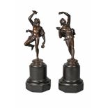 A pair of French bronze figures of Bacchanals, 19th century, each modelled dancing in wild