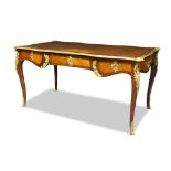 A Louis XV style gilt metal mounted kingwood and tulipwood serpentine bureau plat, second half