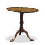 A George III style mahogany tilt top occasional table, late 19th Century, the shaped pie crust top