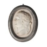 An Italian Carrara marble oval portrait relief of a Roman emperor, possibly Vespasian, 18th century,