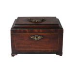 A George III mahogany and crossbanded tea caddy, circa 1770, with moulded brass handle and