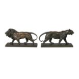 After Antoine-Louis Barye, French, 1796-1895 two bronze models of a lion and lioness, signed to
