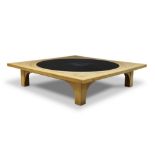 A large marble and parquetry low table, of recent manufacture, the square top inset with black