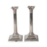 A pair of Victorian silver Corinthian column candlesticks, London 1898, Elkington & Co. Ltd., raised