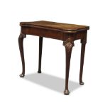 A George II mahogany card table, the fold over top revealing blue baize lined playing surface with