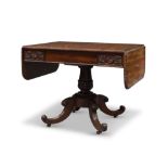 A Regency mahogany sofa table, the rectangular top with beaded edge and two drop leaves, above